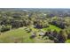 Expansive aerial view of a property highlighting lush surrounding forests and the boundary lines at 2603 Brogden Rd, Creedmoor, NC 27522