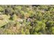 Aerial view of the property, surrounded by trees at 2603 Brogden Rd, Creedmoor, NC 27522