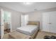 Comfortable bedroom with neutral walls, and a queen sized bed at 2603 Brogden Rd, Creedmoor, NC 27522