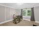 Bright office space featuring a glass top desk, neutral paint, carpet and window with natural light at 2603 Brogden Rd, Creedmoor, NC 27522