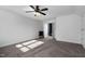 Bedroom featuring neutral carpet, a ceiling fan, and wood trim at 2905 Glendale Rd, Kenly, NC 27542