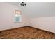 Bedroom featuring hardwood floors, natural light, and light pink walls at 2905 Glendale Rd, Kenly, NC 27542