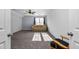 Bonus Room featuring neutral carpet, a couch, and a window at 2905 Glendale Rd, Kenly, NC 27542