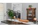 Open dining room with view into the kitchen and decorative furnishings at 2905 Glendale Rd, Kenly, NC 27542