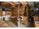Cozy indoor space featuring rustic wooden walls, a small table, and a charming vintage Coca-Cola motif at 2905 Glendale Rd, Kenly, NC 27542