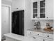 Bright white kitchen with stainless steel appliances and modern subway tile at 2905 Glendale Rd, Kenly, NC 27542