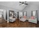 Bright living room with hardwood floors, vaulted ceiling, and columns at 2905 Glendale Rd, Kenly, NC 27542