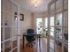 Bright office space with hardwood floors, lots of windows, and French doors at 2932 Candlehurst Ln, Raleigh, NC 27616