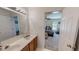 Bathroom featuring a vanity with a sink and view to the bedroom at 30 Shannon Rd, Timberlake, NC 27583