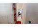 The bathroom features a lavatory, red rug, and decorative shower curtain at 30 Shannon Rd, Timberlake, NC 27583
