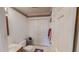 Bathroom with white cabinets, a large closet, and a tiled floor at 30 Shannon Rd, Timberlake, NC 27583