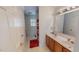This bathroom features double sinks, cherry cabinets and a separate lavatory at 30 Shannon Rd, Timberlake, NC 27583