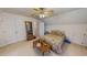 This bedroom boasts a ceiling fan, plenty of closet space and lots of natural light at 30 Shannon Rd, Timberlake, NC 27583