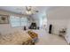 This bedroom offers a ceiling fan, neutral colors and plenty of natural light at 30 Shannon Rd, Timberlake, NC 27583