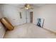 Spacious bedroom with neutral carpet, ceiling fan and ample closet space at 30 Shannon Rd, Timberlake, NC 27583