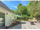 Outdoor deck with a dining table set and cushioned seating at 30 Shannon Rd, Timberlake, NC 27583