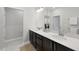 Modern bathroom featuring dual sinks, dark wood cabinets, and great counter space at 301 Crayton Oak Dr, Cary, NC 27519