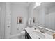 Clean bathroom with a single sink vanity, framed mirror, and modern fixtures at 301 Crayton Oak Dr, Cary, NC 27519
