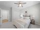 Cozy bedroom with soft carpet, ceiling fan, and a serene atmosphere at 301 Crayton Oak Dr, Cary, NC 27519