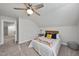 Bedroom featuring neutral walls, carpet, natural lighting and ceiling fan at 301 Crayton Oak Dr, Cary, NC 27519