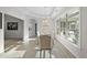 Dining room with tray ceiling, large picture window and four upholstered chairs at 301 Crayton Oak Dr, Cary, NC 27519