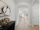 Bright foyer with arched doorways leading to the kitchen and other living spaces at 301 Crayton Oak Dr, Cary, NC 27519