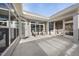 Inviting covered patio featuring seating area with neutral colors and a bright sunny view at 301 Crayton Oak Dr, Cary, NC 27519