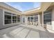 Outdoor patio area with seating, natural light and neutral decor at 301 Crayton Oak Dr, Cary, NC 27519