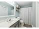 Bathroom featuring shower with tub, vanity, and plenty of storage space at 3050 Trailwood Pines Ln # 101, Raleigh, NC 27603