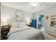 Cozy bedroom with a ceiling fan, window, furnishings and attached bathroom at 3050 Trailwood Pines Ln # 101, Raleigh, NC 27603