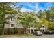 Charming two-story condo building with manicured landscaping and ample parking at 3050 Trailwood Pines Ln # 101, Raleigh, NC 27603