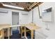 Unfinished basement with ample storage space and a large utility sink at 323 Brandermill Dr, Durham, NC 27713