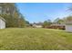 Expansive backyard, offering plenty of space with mature trees at 324 Dare St, Burlington, NC 27217