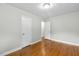 Spacious bedroom with hardwood floors and ample natural light at 324 Dare St, Burlington, NC 27217