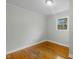 Bedroom featuring hardwood floors and one window at 324 Dare St, Burlington, NC 27217