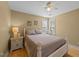Comfortable bedroom with natural light, ceiling fan and neutral color palette at 3424 English Cir, Willow Springs, NC 27592