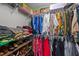 Spacious walk-in closet with organized shelving, hanging rods and shoe storage at 3424 English Cir, Willow Springs, NC 27592