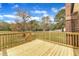 New back deck overlooks large green space with a wooded view at 3533 N Way Dr, Zebulon, NC 27597