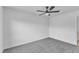 An airy bedroom featuring gray carpet, a ceiling fan, and neutral-toned walls at 3533 N Way Dr, Zebulon, NC 27597