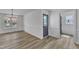 Elegant dining room with exterior door and windows offering ample natural light at 3533 N Way Dr, Zebulon, NC 27597