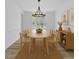 Elegant dining room with a modern chandelier, wood table, and stylish decor at 3533 N Way Dr, Zebulon, NC 27597