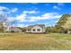 Charming single-story home featuring white siding, a welcoming front porch, and a spacious front lawn at 3533 N Way Dr, Zebulon, NC 27597