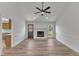 Inviting living room with a fireplace and access to the kitchen at 3533 N Way Dr, Zebulon, NC 27597