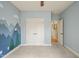 Bedroom with plush carpeting, ample closet space, and mountain wall design at 367 Windham Way, Clayton, NC 27527
