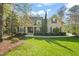 Charming home featuring a lush green lawn, manicured landscaping, and a classic architectural design at 367 Windham Way, Clayton, NC 27527