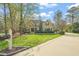 Charming home with well-maintained lawn, mature trees, and a long driveway at 367 Windham Way, Clayton, NC 27527