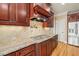 Elegant kitchen features custom cabinets and stainless-steel appliances at 367 Windham Way, Clayton, NC 27527