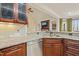 Close up of kitchen sink and counter area with custom cabinetry at 367 Windham Way, Clayton, NC 27527