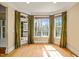 Sunroom with floor to ceiling windows allowing for lots of natural light at 367 Windham Way, Clayton, NC 27527