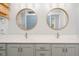 Bathroom vanity with double sinks, stylish mirrors, and modern fixtures create an elegant design at 370 Chapel Ridge Dr, Pittsboro, NC 27312